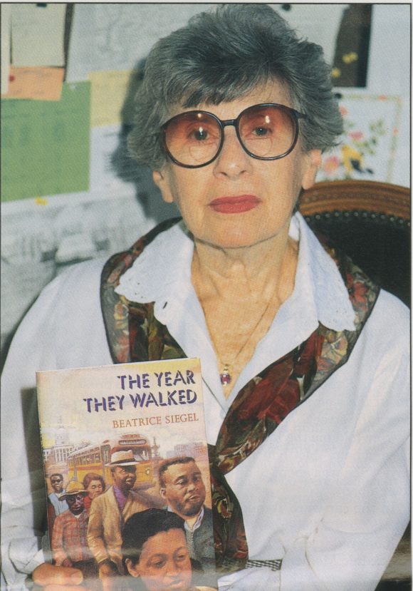 Beatrice Siegel holding one of her books (1996)
